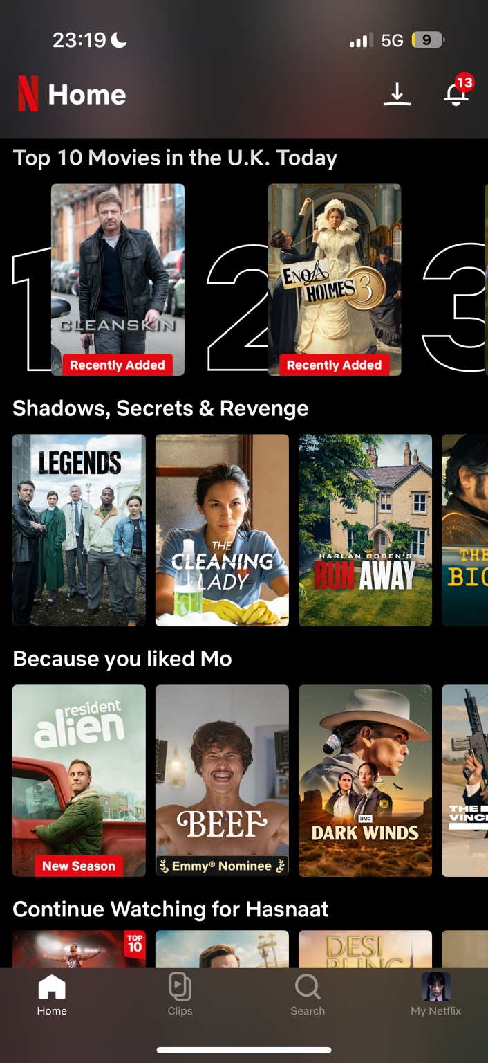 Netflix mobile iOS homepage showing Top 10 Movies in the UK, Shadows Secrets and Revenge row, Because you liked Mo row and Continue Watching